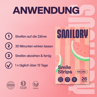Smilory® Zahnaufhellungsstreifen auf Zähnen, sichtbare Anwendung und Passform für ein strahlendes Lächeln.