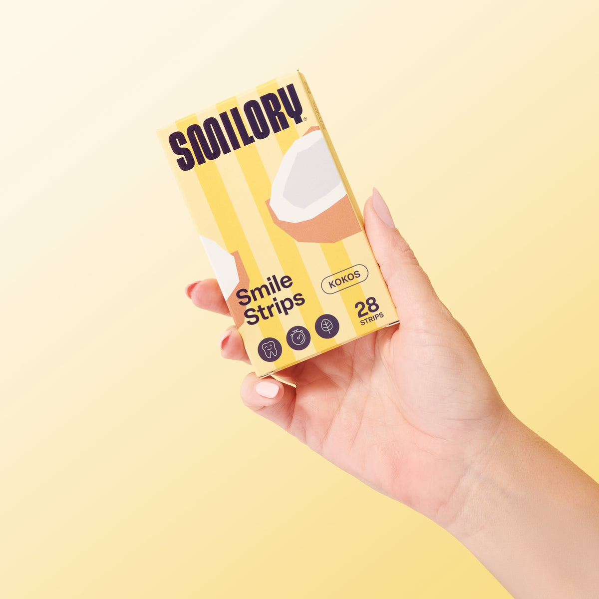 Smilory® Zahnaufhellungsstreifen, nahaufnahme der weißen Streifen für strahlend weiße Zähne, Anwendung auf den Zähnen sichtbar